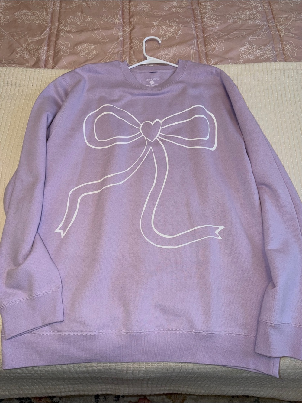 Lavender Crewneck Sweatshirt with White Bow Graphic - Women